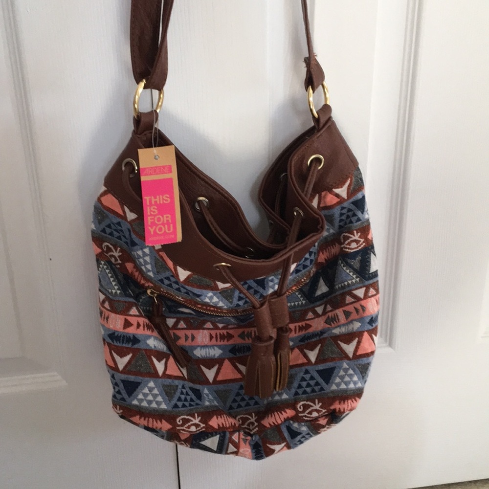 Cross body tassel purse
